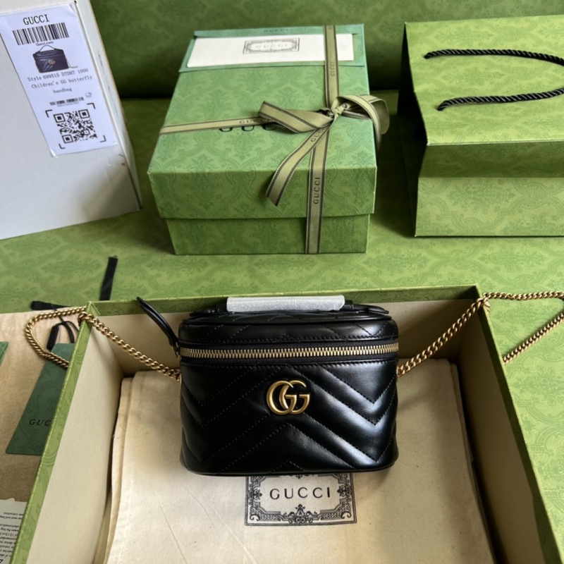 G*u*i cosmetic bags